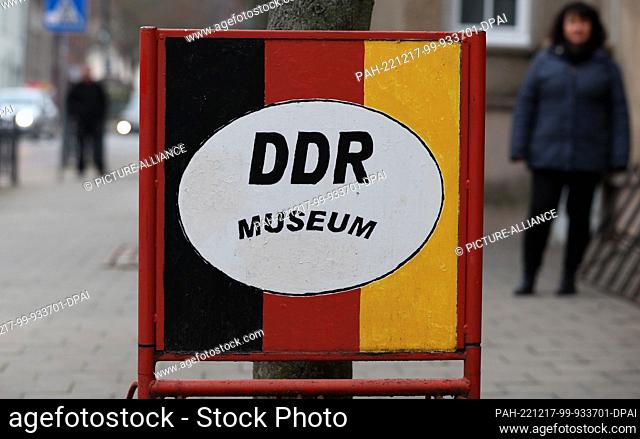 PRODUCTION - 29 November 2022, Mecklenburg-Western Pomerania, Malchow: A bicycle stand with the inscription ""DDR Museum"" stands in front of the DDR Museum