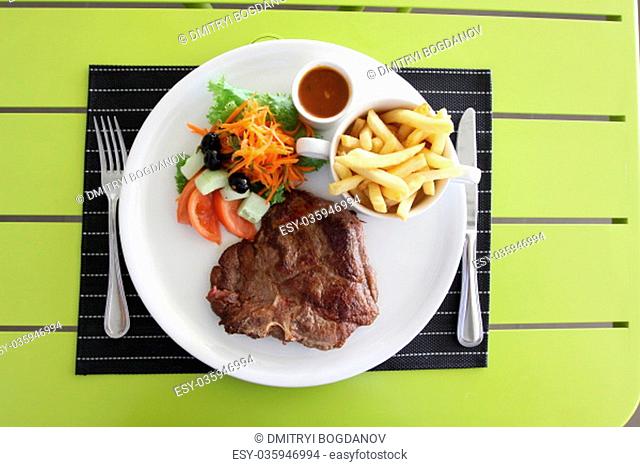 Restaurant menu. Dishes which give at restaurants. Salads, second courses, pizza and other