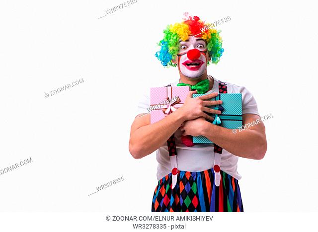 Funny clown with a gift present box isolated on white background
