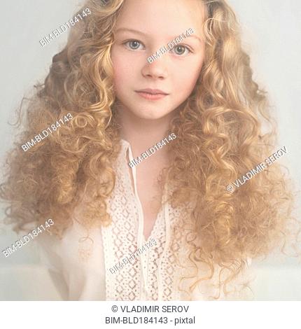 Caucasian teenage girl with curly hair