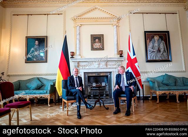 08 April 2022, Great Britain, London: German Chancellor Olaf Scholz (SPD - l), sits down for talks with Boris Johnson, Prime Minister of the United Kingdom