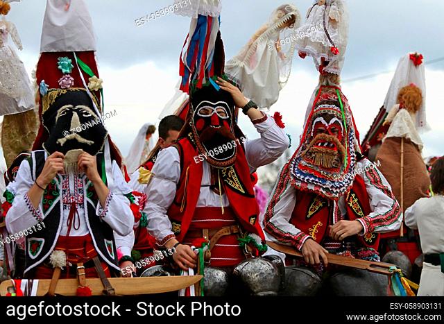 Elin Pelin, Bulgaria - February 15, 2020: Masquerade festival in Elin Pelin, Bulgaria. People with mask called Kukeri dance and perform to scare the evil...