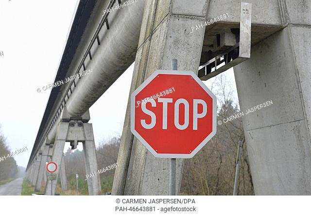 A stop sign stands under the former Transrapid test track in Lathen, Germany, 22 February 2014. The operating licence of the Transrapid test track expired at...