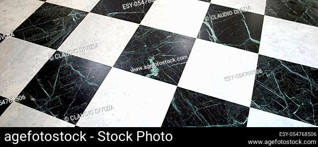 wide Black and white checked floor useful as a background
