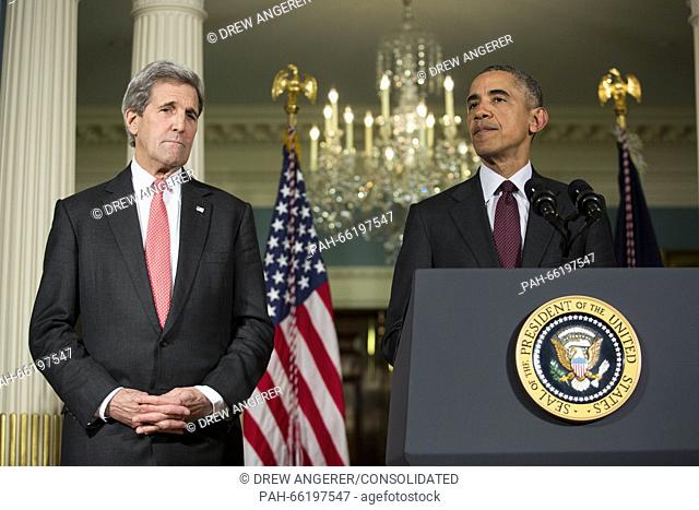 United States Secretary of State John Kerry, left, looks on as US President Barack Obama, right, makes a statement after meeting with his National Security...