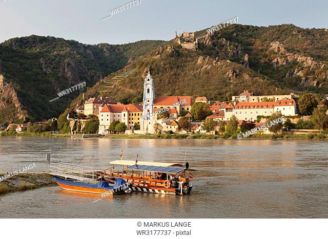View over Danube River to Collegiate church and castle ruins, Durnstein, Wachau, Lower Austria, Austria, Europe