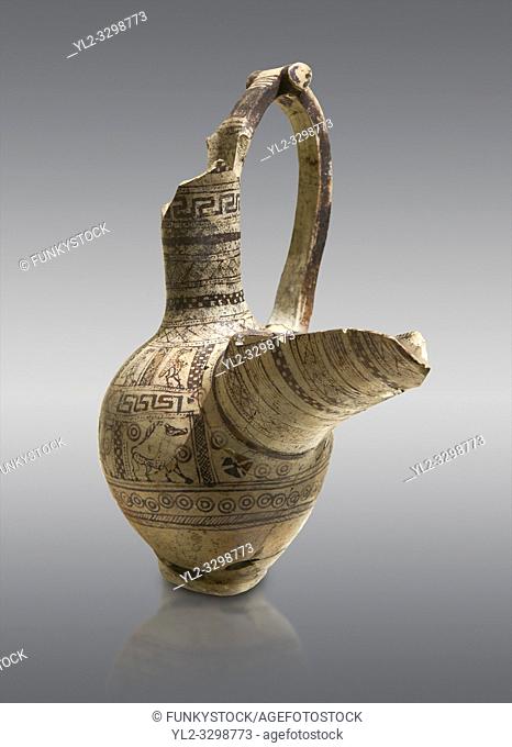 Phrygian terra cotta pottery vessel with a strainer and long pouring lip, decorated with geometric designs and images of animals and birds, from Gordion