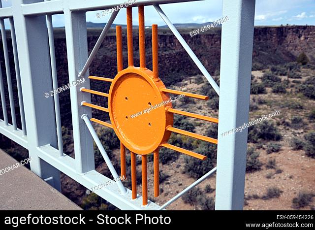 New Mexico symbol - Zia sun, included in the railing on the Rio Grande Gorge Bridge. Taos, New Mexico