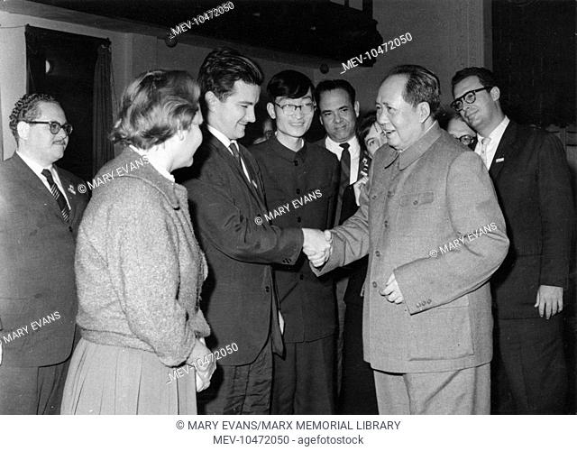 Chinese Communist leader, Mao Zedong (1893-1976), also known as Chairman Mao. Seen here meeting and greeting some western visitors