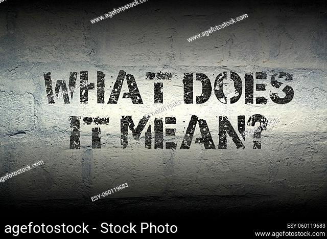 what does it mean question stencil print on the grunge white brick wall