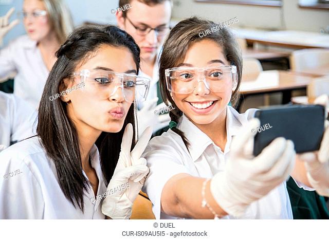 Students taking selfie in lab