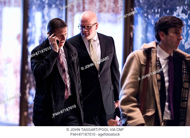Michael Flynn (L) arrives at Trump Tower in Manhattan, New York, U.S., on Thursday, January 12, 2017. Credit: John Taggart / Pool via CNP - NO WIRE SERVICE -...