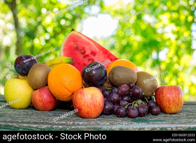 fruits in wooden table, outdoor