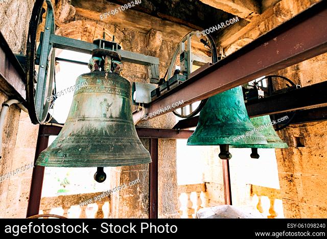 The bells in the chapel. Vintage old large bells in the bell tower near the church, in Croatia and Montenegro