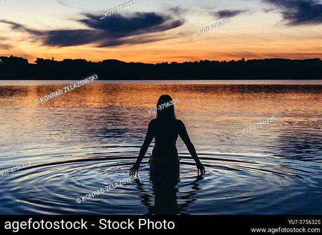Sunset over Radunskie Dolne lake in Kashubian Lake District of Poland