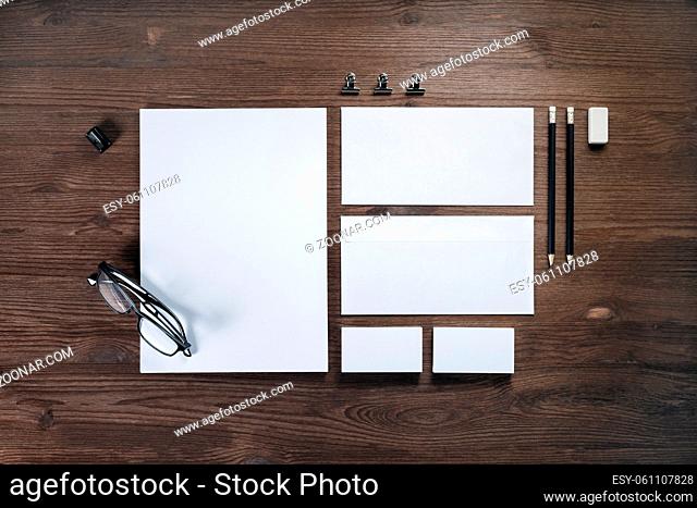 Blank stationery set on wooden background. ID template. Mockup for branding identity for designers. Flat lay
