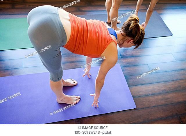 Two women doing yoga class