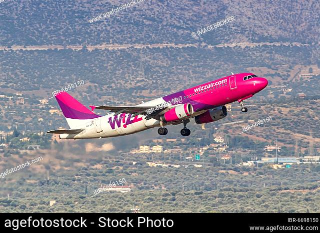 An Airbus A320 aircraft of Wizzair with registration number HA-LPV at Athens Airport, Greece, Europe