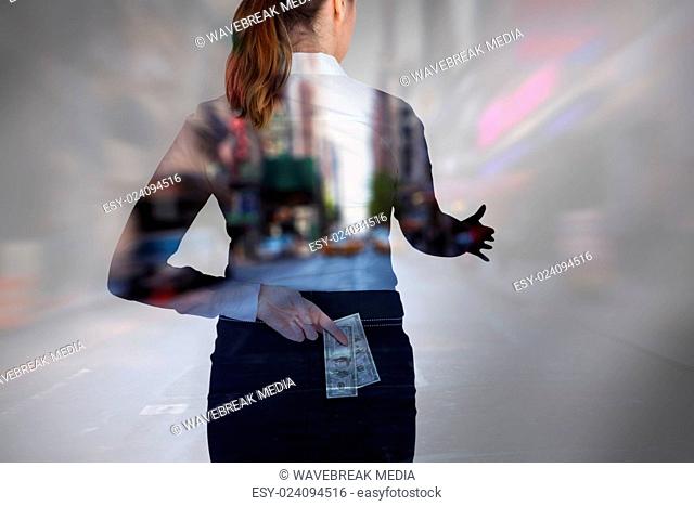 Composite image of businesswoman offering handshake with fingers crossed behind her back