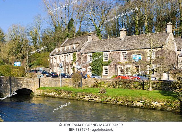 The Swan Hotel over river Coln, Arlington, Bibury, the Cotswolds, Gloucestershire, England, United Kingdom, Europe