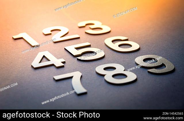 Mathematics background made with solid numbers from 1 to 9 - Closeup view