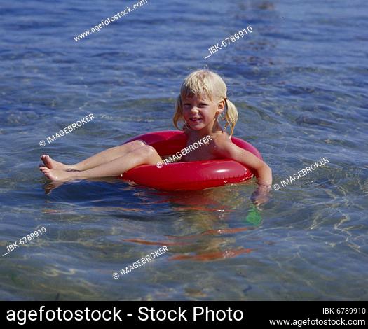 Girl with Floating Hoop in the Sea Floating Ring
