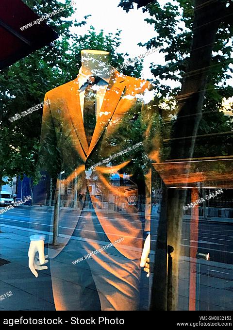 Mannequin wearing suit in a shop window. Madrid, Spain