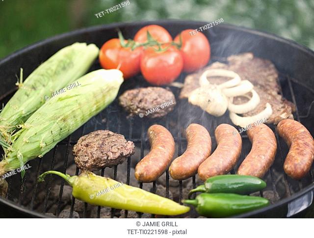 Food cooking on a grill