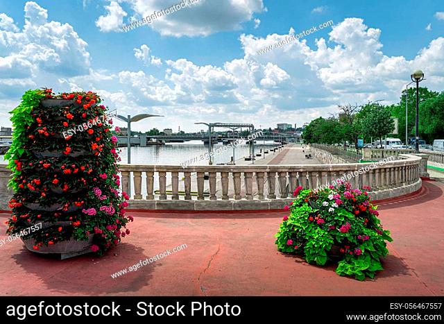 Flower decoration on Long Bridge, called Most Dlugi on Wyszynskiego st. in Szczecin, Poland. Promenade and boulevards on Odra River pier or embarkment