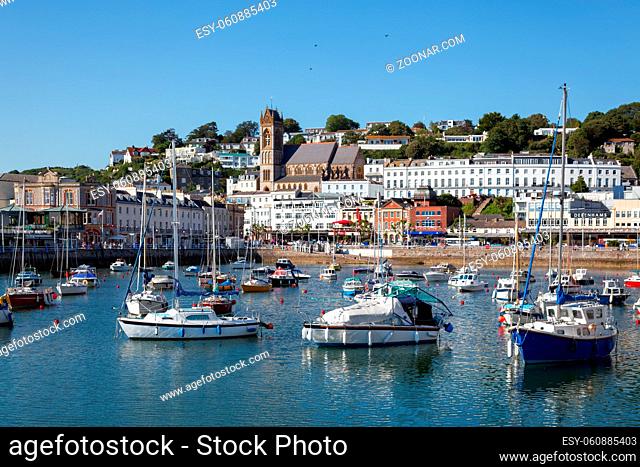 TORQUAY, DEVON/UK - JULY 28 : View of the Town and Harbour in Torquay Devon on July 28, 2012. Unidentified people