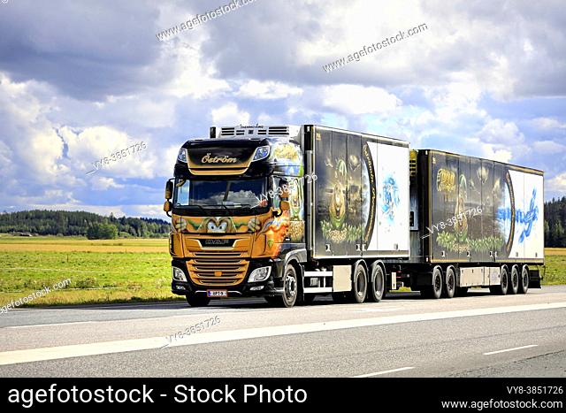 Beautifully customised DAF XF530 truck Öström Pro Trans Oy pulls Thermo King refrigerated trailer on highway 2. Jokioinen, Finland. Aug 28, 2020.