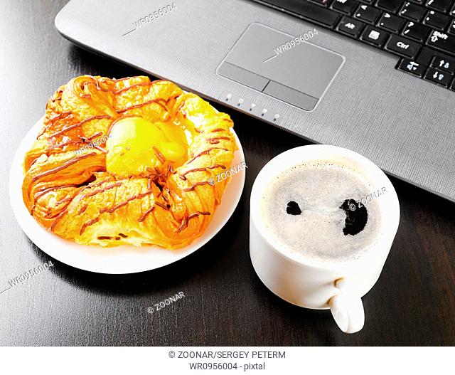 laptop and cup of coffee