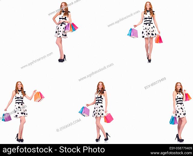 Beautiful woman with bags isolated on white