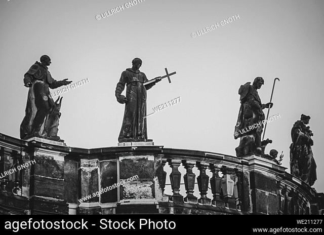 Dresden, Saxony, Germany: Four of the so-called Mattielli statues on the outer balustrade of the Hofkirche (Cathedral), they are St