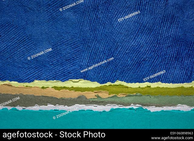dark blue sky over rolling fields and lake - colorful landscape abstract created with sheets of handmade textured paper