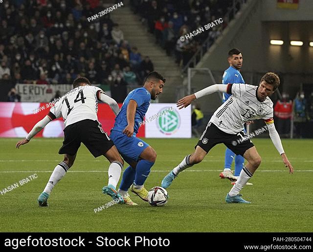 March 27, 2022, PreZero Arena, Sinsheim, friendly match Germany vs. Israel, in the picture Jamal Musiala (Germany), Mohammed Abu Fani (Israel)