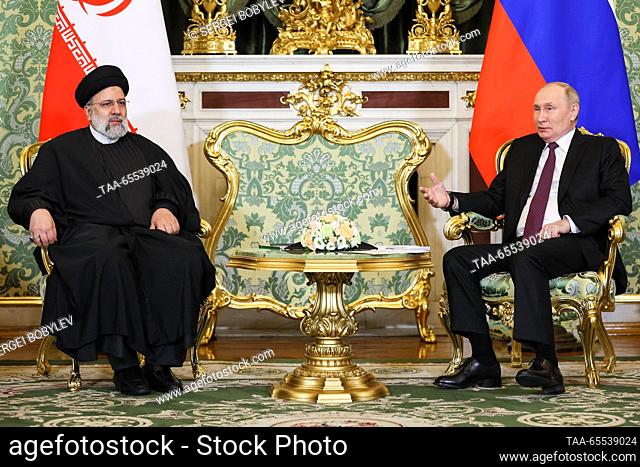 RUSSIA, MOSCOW - DECEMBER 7, 2023: Russia's President Vladimir Putin (R) and Iran's President Ebrahim Raisi hold a meeting at the Moscow Kremlin