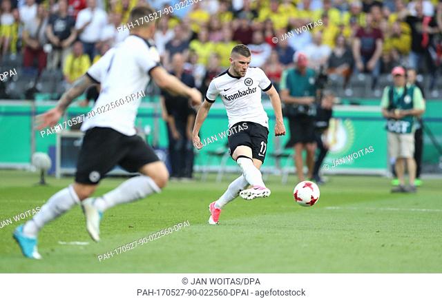 Frankfurt's Ante Rebic scores 1-1 against Dortmund's goalkeeper Roman Buerki during the German DFB Cup final between Eintracht Frankfurt and Borussia Dortmund...