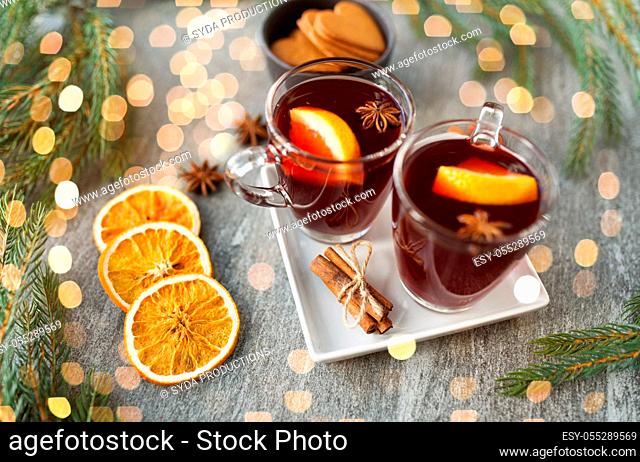 mulled wine, orange slices, gingerbread and spices