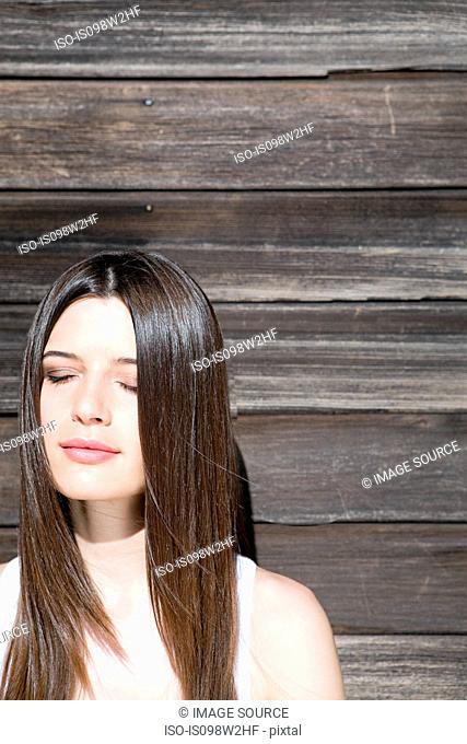 Serene woman with eyes closed