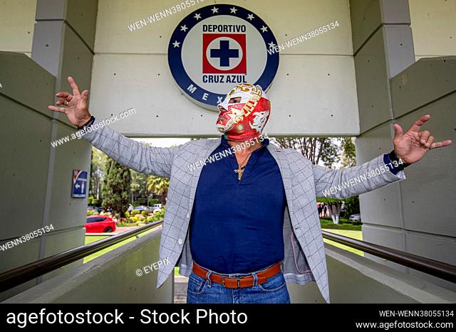 Wrestler Dr Wagner poses for photographs before a press conference at La Noria, high performance Center of the Cruz Azul football team on August 4 2021 in...