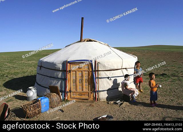 Children outside their tent