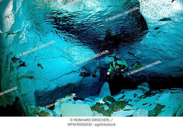 Scuba diver in underwater cave Cueva Taina, Punta Cana Freshwater, Dominican Republic