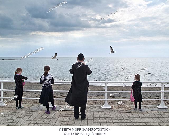 Orthodox hasidic jewish families on summer holiday in Aberystwyth Ceredigion Wales UK