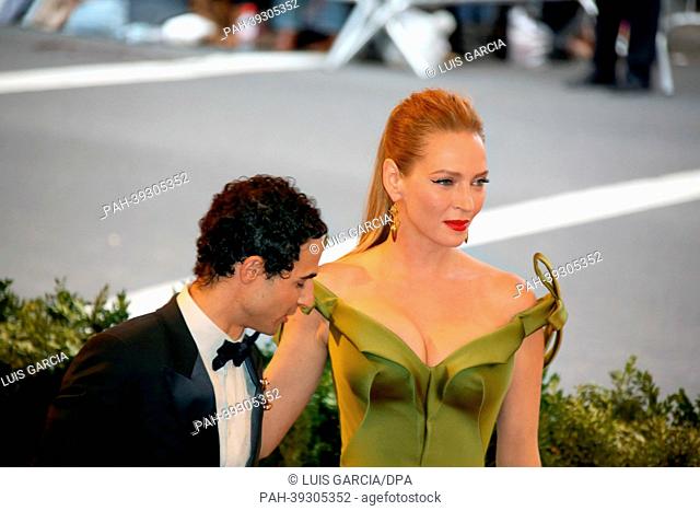 Actress Uma Thurman and designer Zac Posen arrive at the Costume Institute Gala for the ""Punk: Chaos to Couture"" exhibition at the Metropolitan Museum of Art...