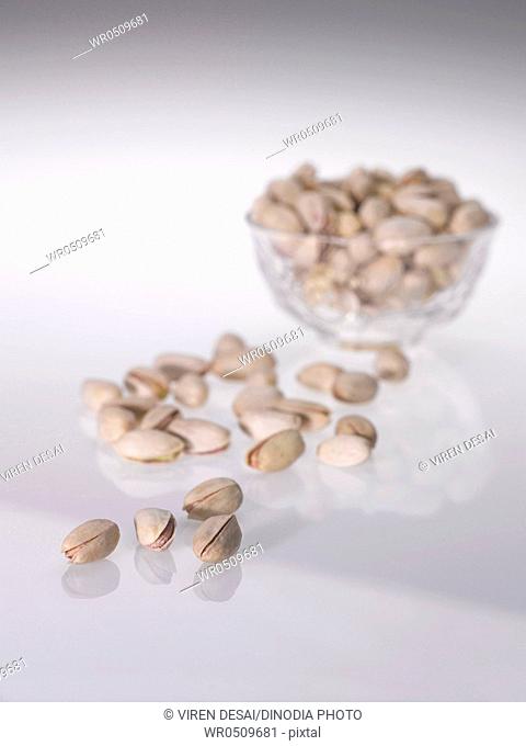 Dryfruit and nuts , pistachio on white background