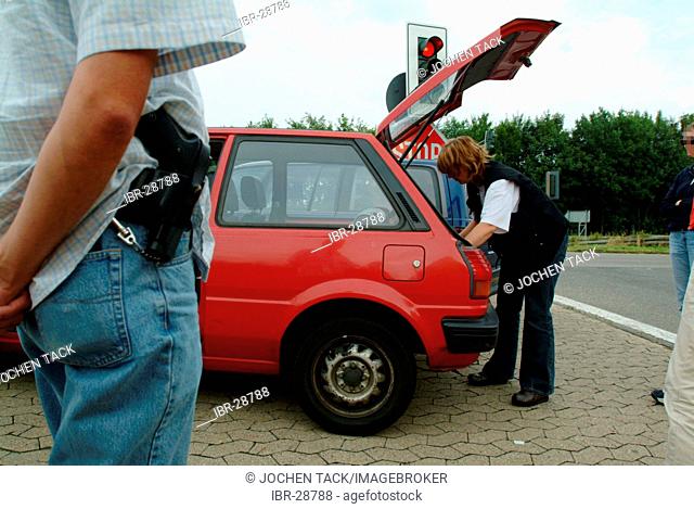 DEU, Germany, NRW: Civilian drug squad officers of the Highwaypolice, Highway patrol, controls cars in the german dutch border area