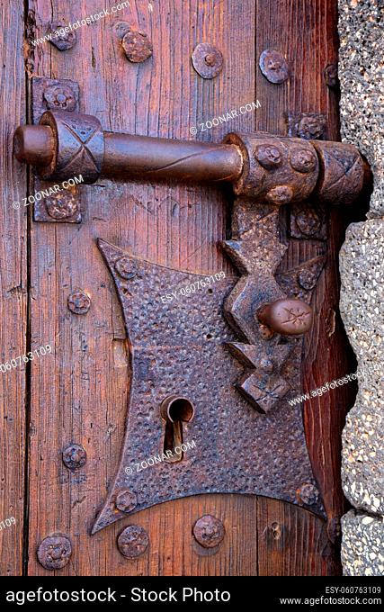 castle lock spain knocker lanzarote abstract door wood in the red brown