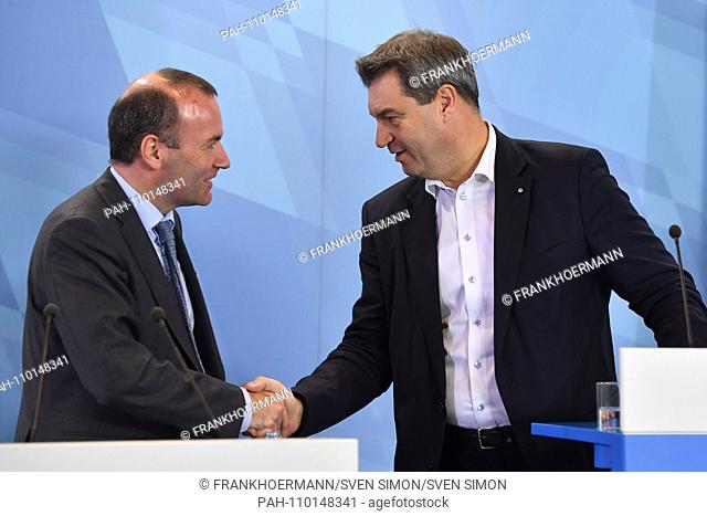 v.li: Manfred Weber (Chairman of the EPP Group in the European Parliament), Markus SOEDER (Prime Minister of Bavaria). Shake hands, handshake, greeting