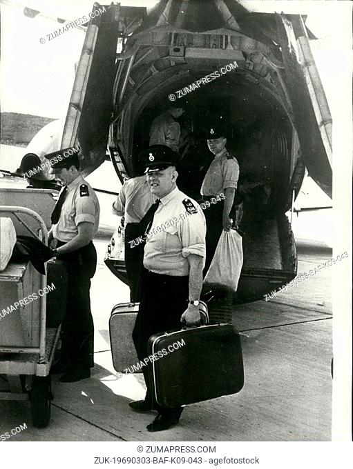 Mar. 03, 1969 - British Police Enroute To Anguilla: Shirt-sleeved British policeman board an Andover transport on Antigua for the short flight to the West...